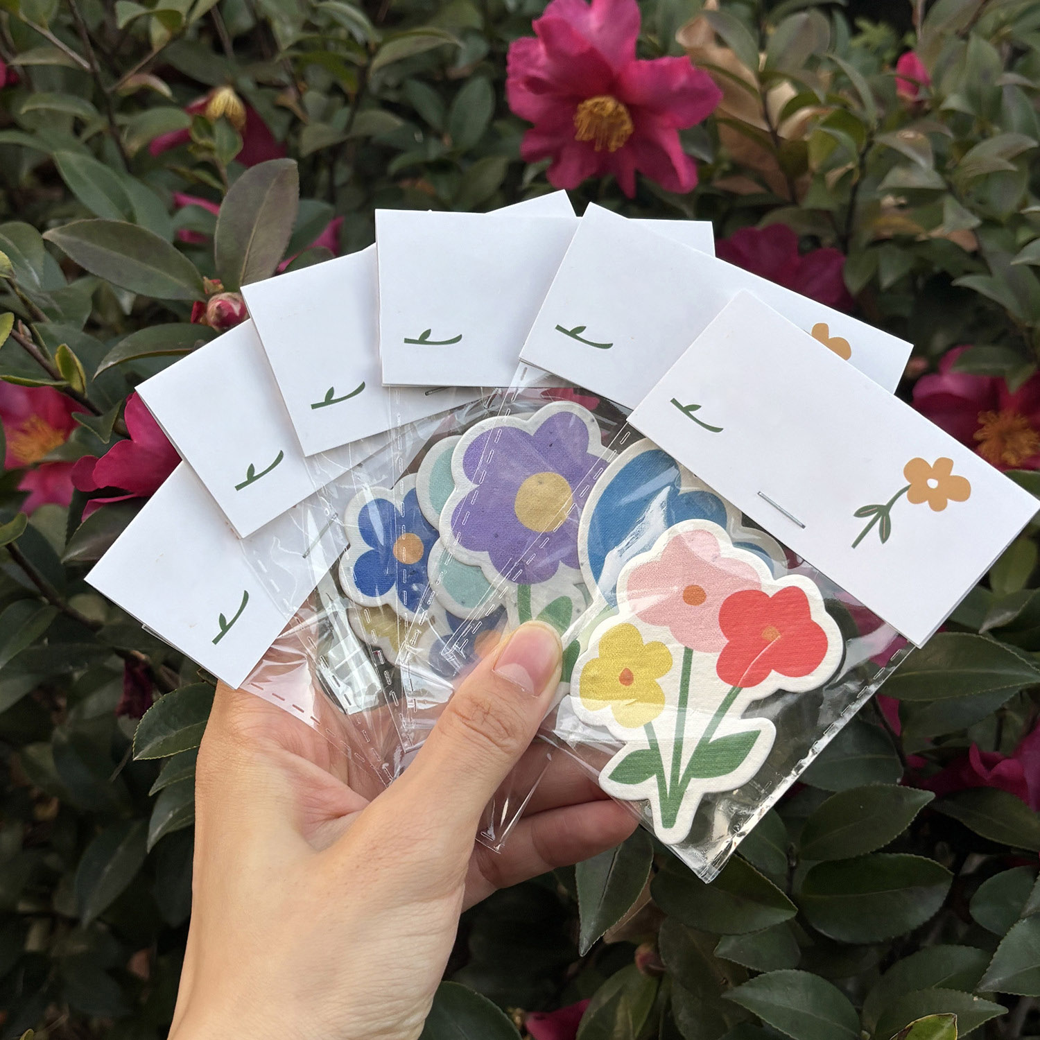 Customized postcards with sprouting flower shapes