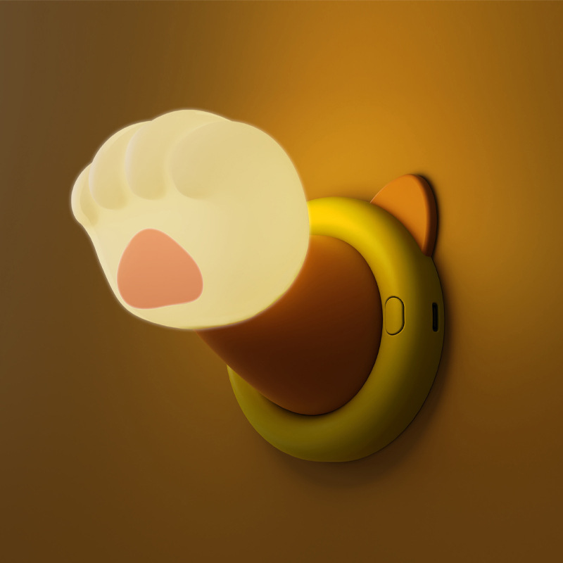 伸出圓手貓爪拍拍小夜燈